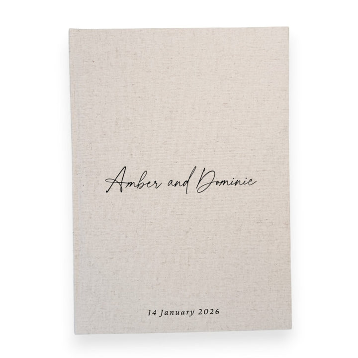 Natural linen personalised wedding guest book with script lettering, portrait format