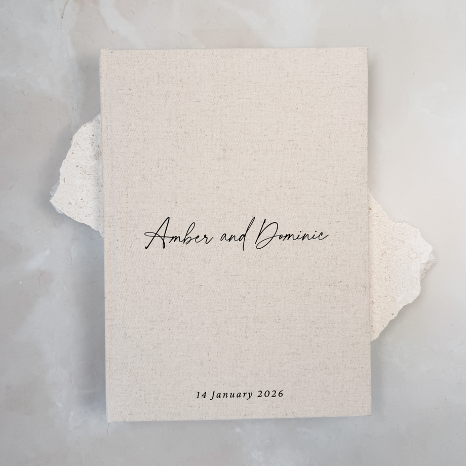 Natural linen personalised wedding guest book with script lettering, portrait format