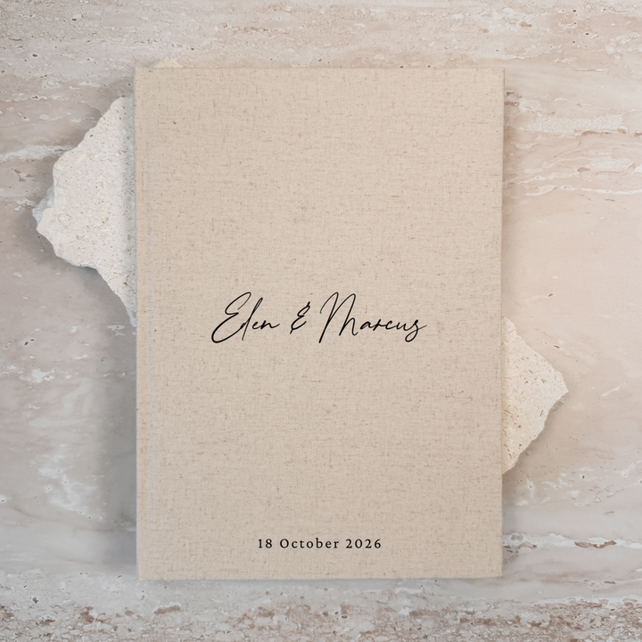 Natural linen personalised wedding guest book with script lettering, portrait format