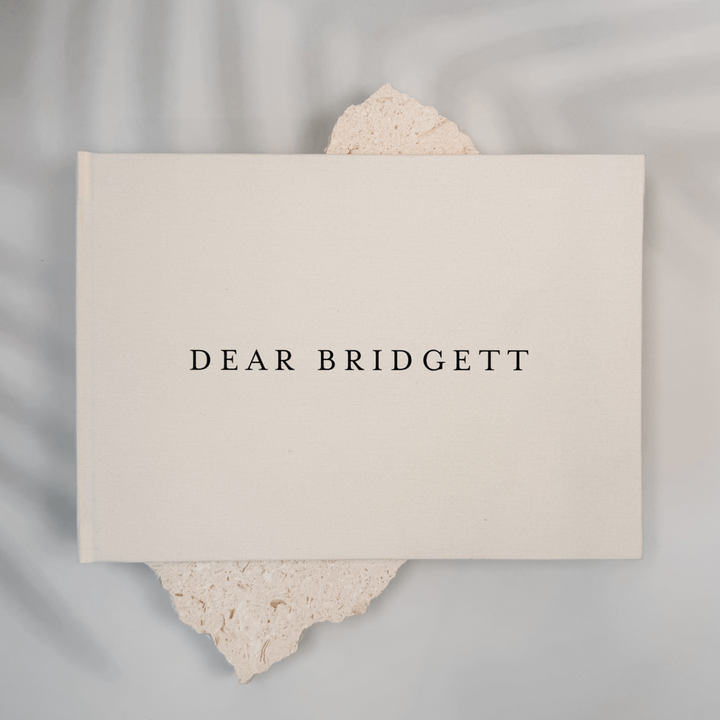 Ivory linen personalised wedding memory book, landscape format